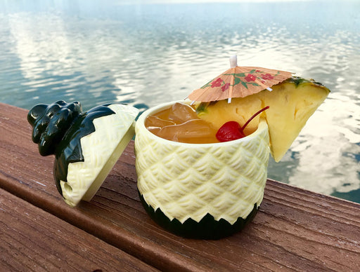 https://cdn.shopify.com/s/files/1/0096/0276/0755/products/dw-tiki-pineap12-pineapple-tiki-glass-summer-cocktail-3_1_512x389.jpg?v=1569329810
