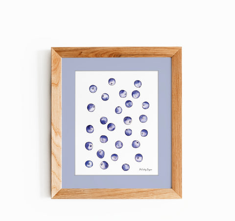watercolor illustration of blueberries in a wood frame