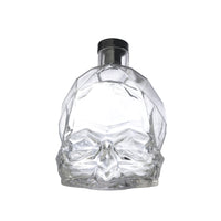 NUDE Memento Mori skull shaped whisky bottle empty front view