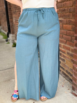 Blue linen pants with slit detail