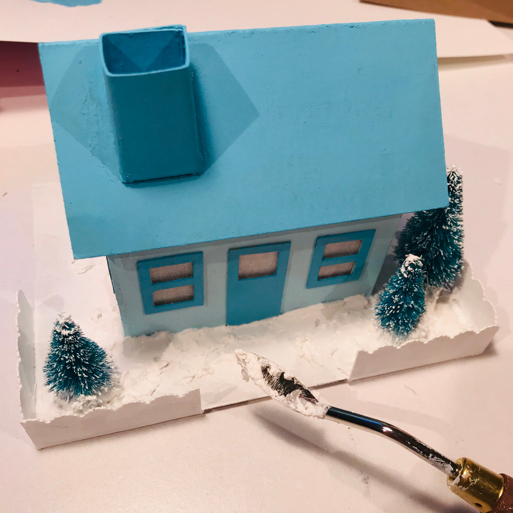 DIY Craft Tutorial - Christmas Village Putz Glitter House - Simple Cottage - Spread fake snow on the ground