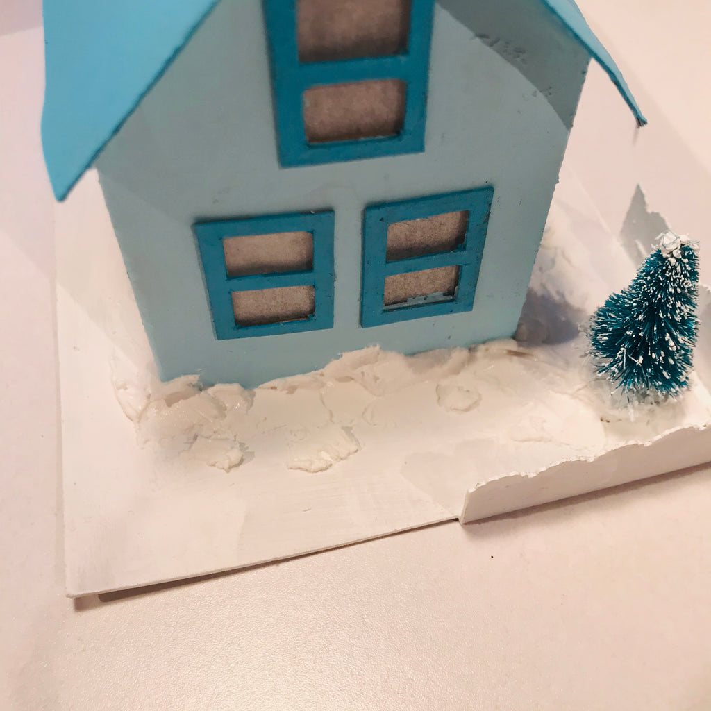 DIY Craft Tutorial - Christmas Village Putz Glitter House - Simple Cottage - Spread fake snow at the foot of the walls