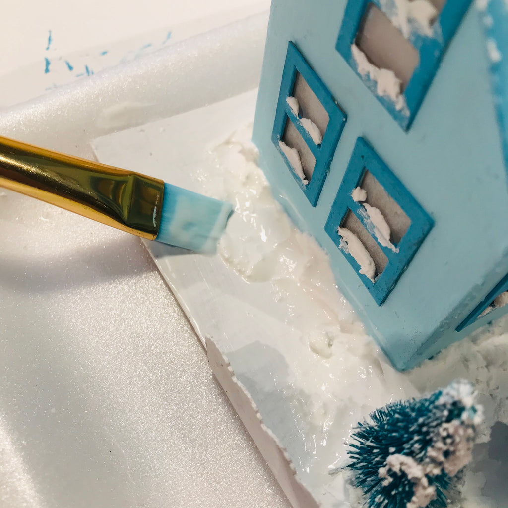 DIY Craft Tutorial - Christmas Village Putz Glitter House - Simple Cottage - Apply Mod Podge to ground with paint brush