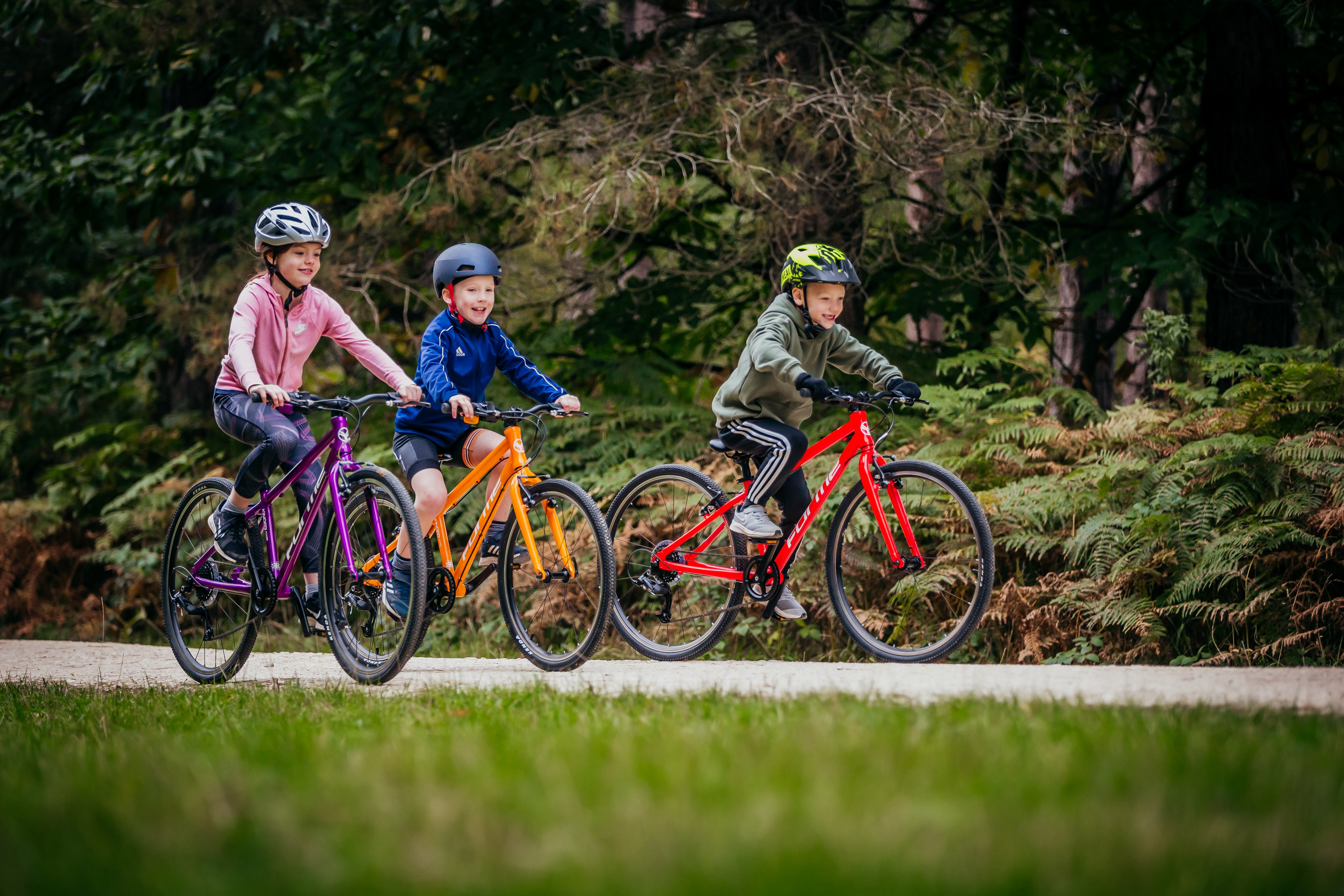 Kids on bikes in forest - bike club