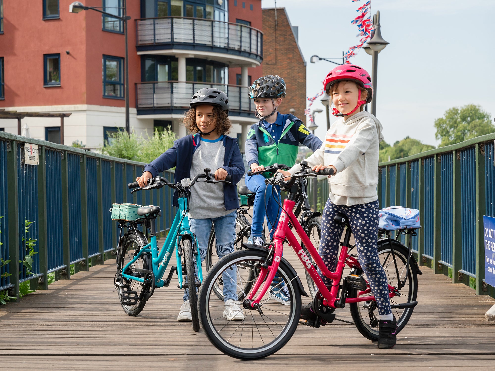 Children in town with bikes - Bike Club