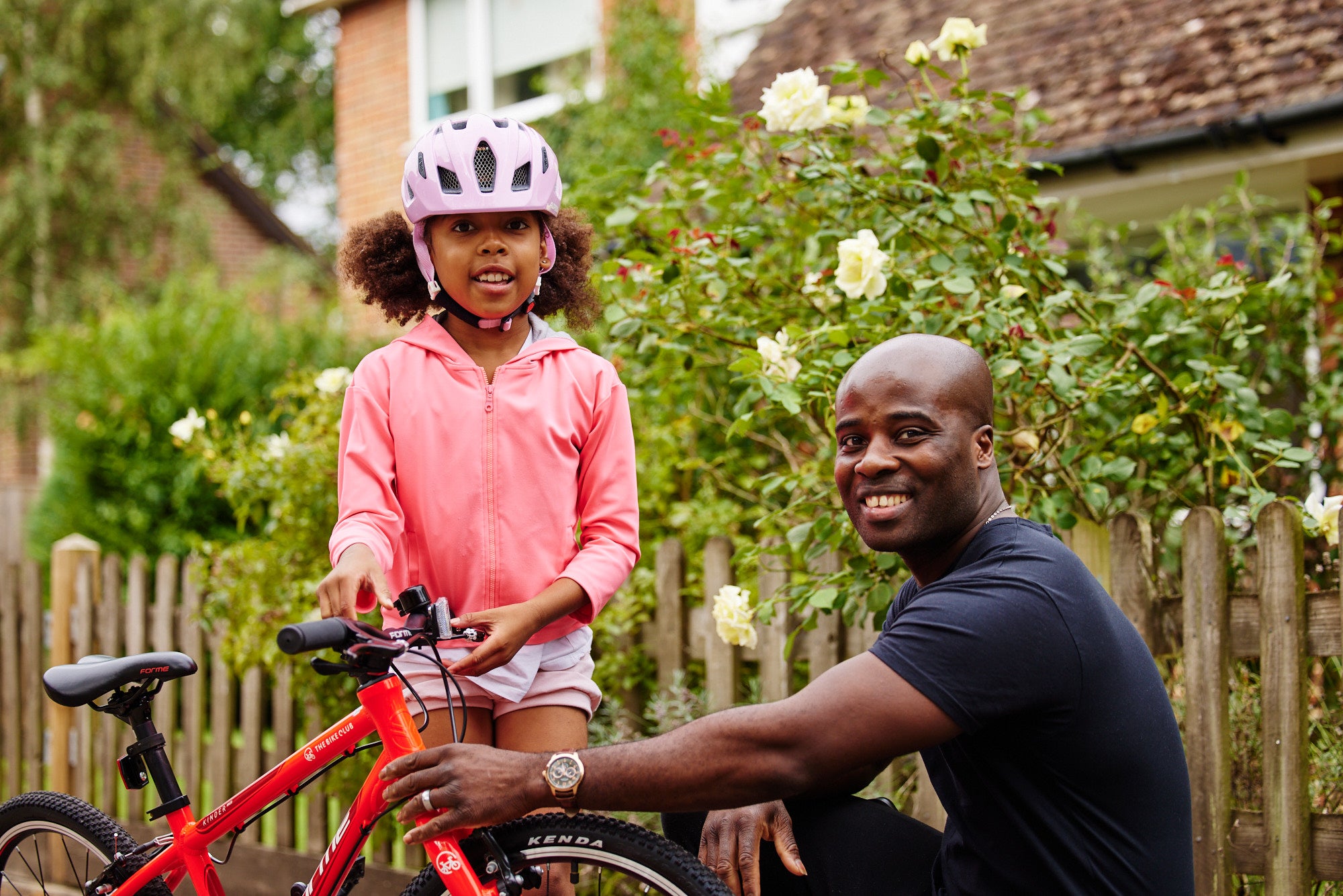 man with daughter and bike - bike club