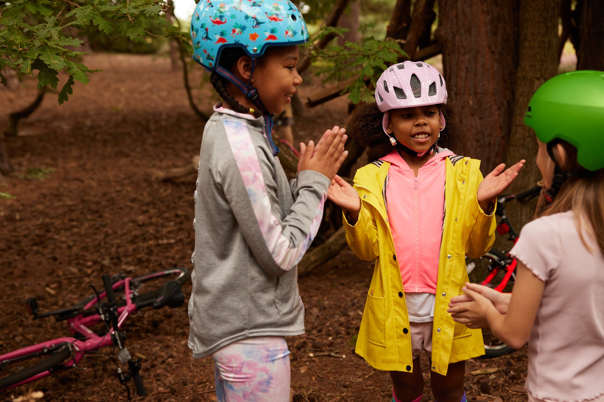 kids playing in a forest - bike club