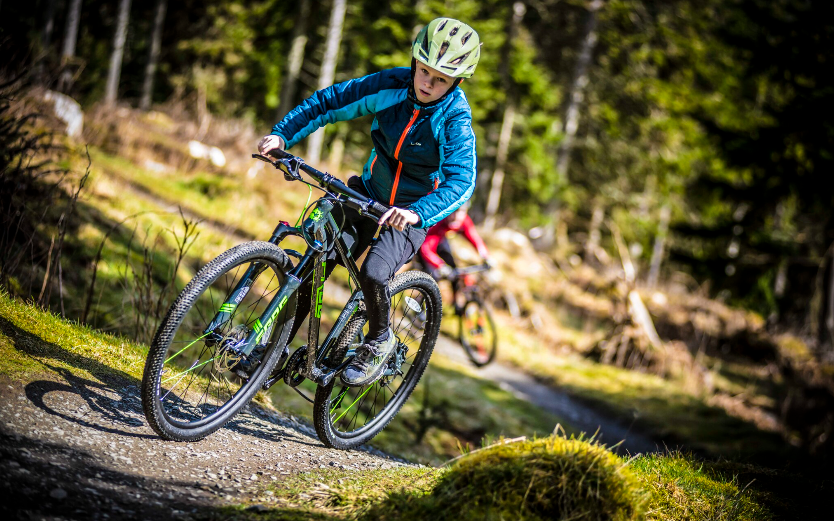 child riding uphill - Bike Club