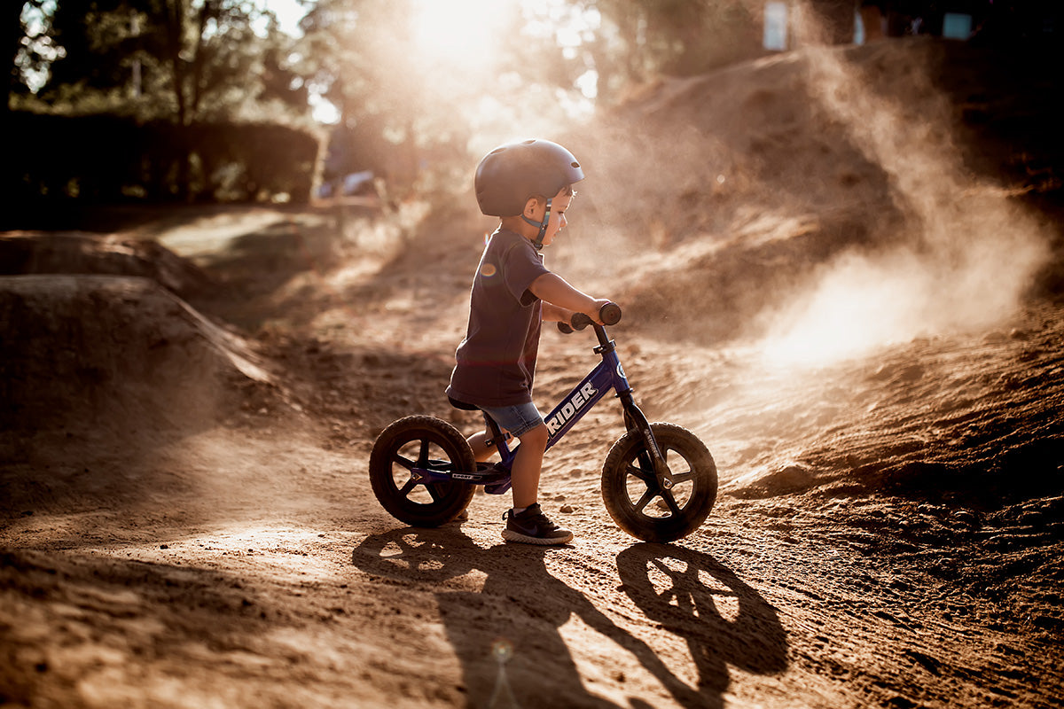 Four year old child on a bike