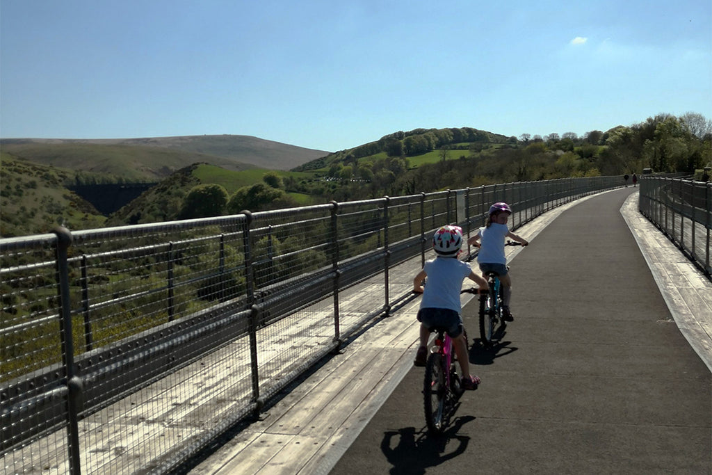 Family bike ride over The Granite Way in Devon