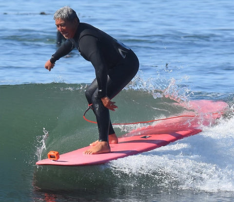 Guy K surfing