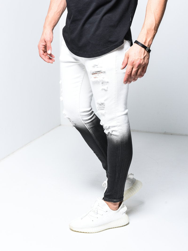 white and black ripped jeans