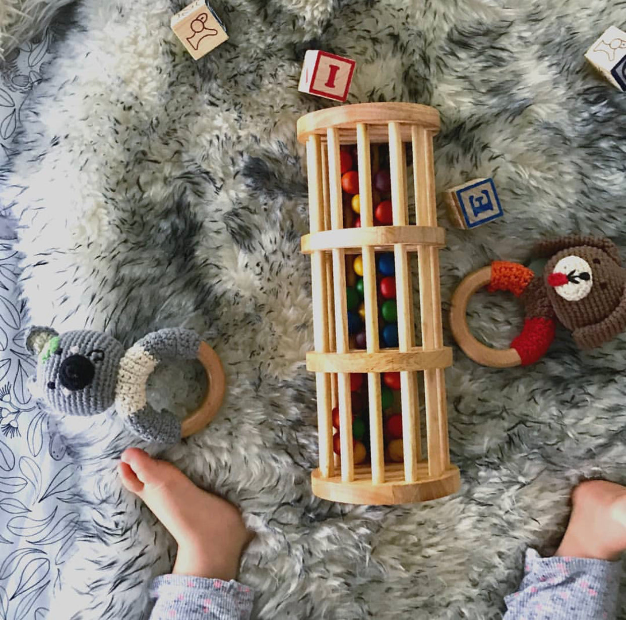 wooden rainmaker toy