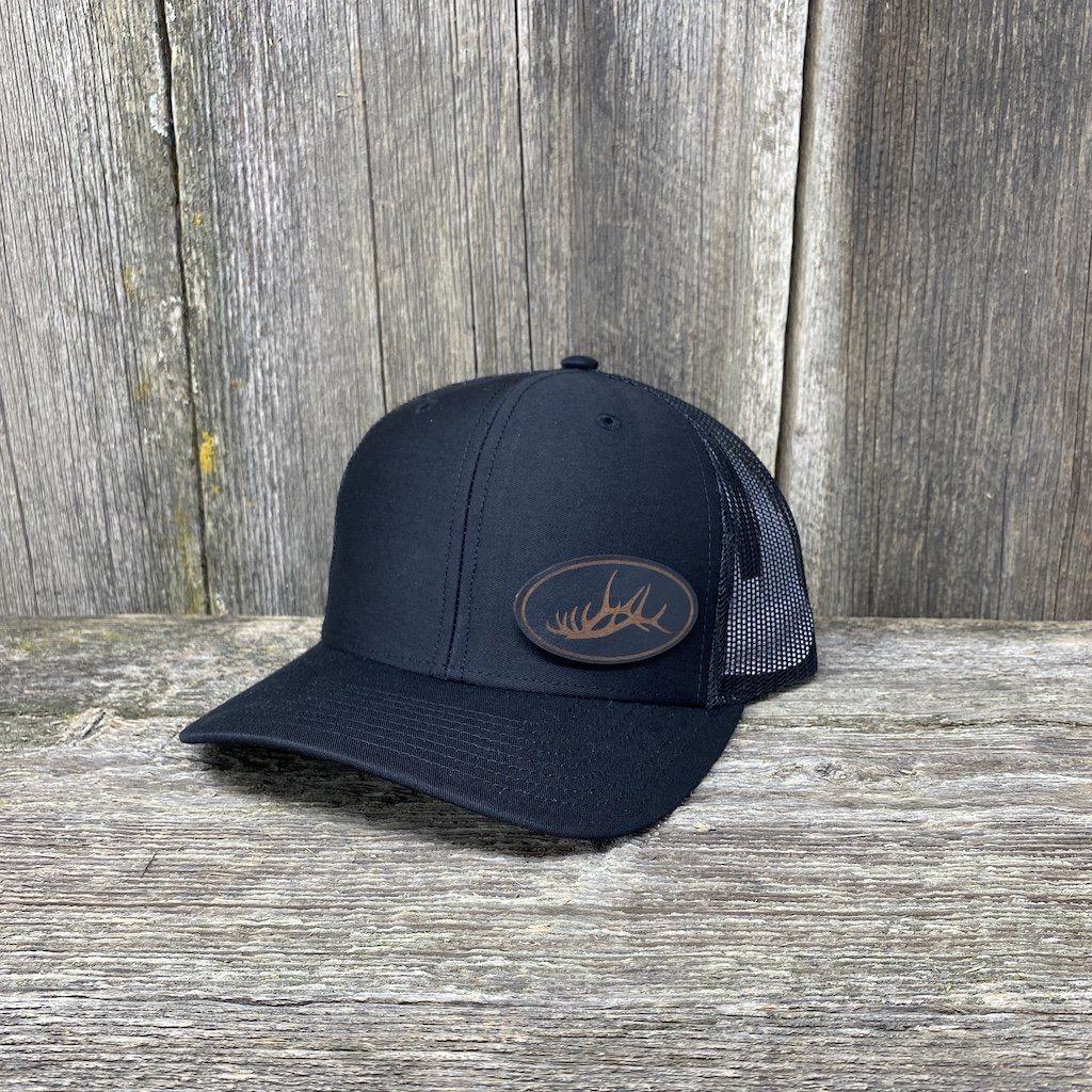 https://cdn.shopify.com/s/files/1/0096/6977/1330/products/elk-rack-black-leather-patch-hat-richardson-112-leather-patch-hats-hells-canyon-designs-solid-black-244015_1200x.jpg?v=1598931243
