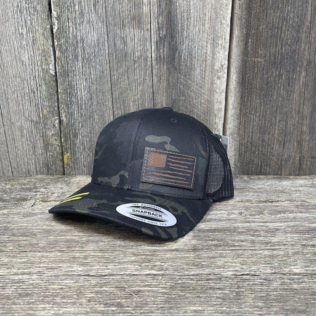 Black distressed hat with upcycled LV patch