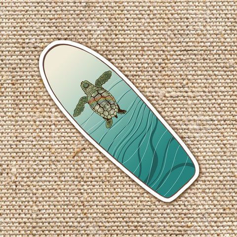 baby green sea turtle swimming illustration on a surfboard shaped sticker