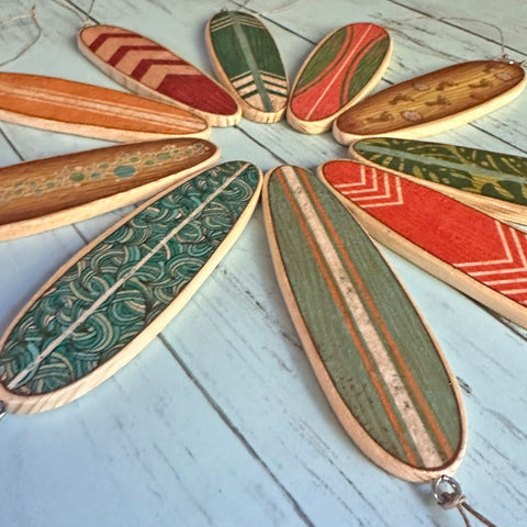 colorful collection of mini wooden surfboards
