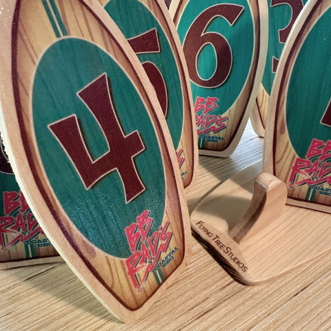 surfboard table numbers for restaurants