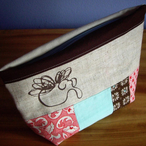 patchwork zippered pouch with silkscreened fabric