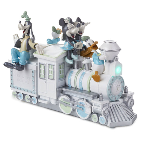 https://cdn.shopify.com/s/files/1/0096/8736/7740/products/Mickey-and-Friends-LightUp-Train-Figurine-With-Sound_1DYG2082_01_large.jpg?v=1674584389