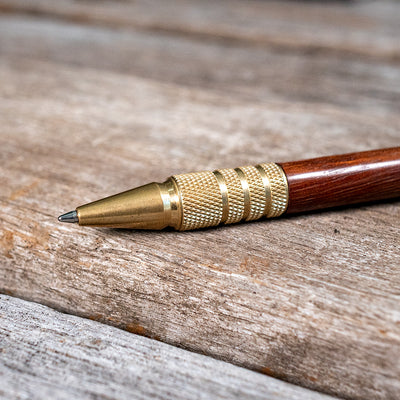 Pen grip with knurled finish.