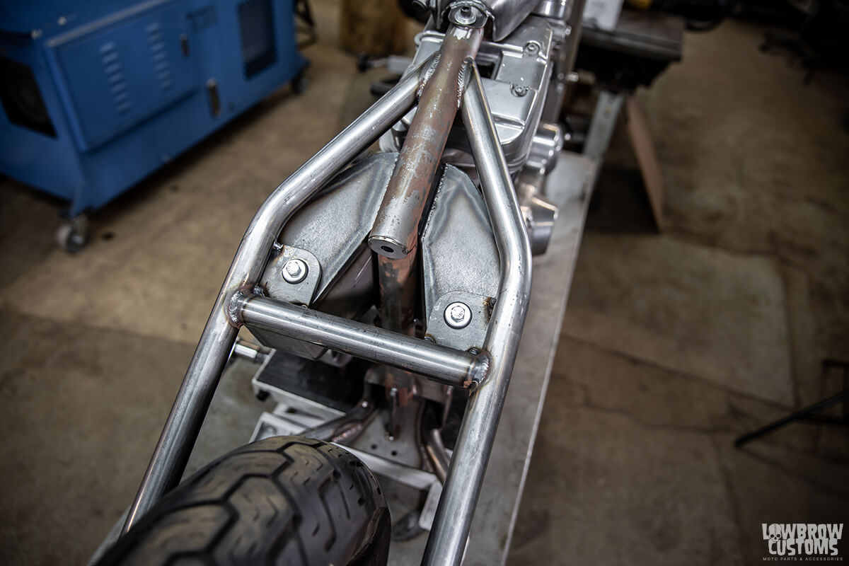 Top oil tank mounts tacked in place on the Sportster hardtail frame.