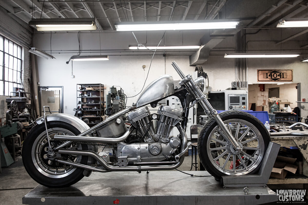 Early stages of Sissy bar, exhaust, headlight brackets and handlebar mock ups. Also the gas tank mounts were located, fabricated and gas tank mounted.