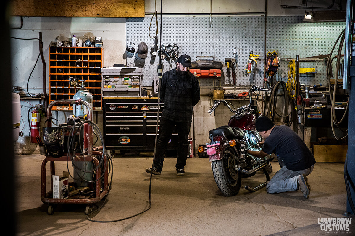 Getting the red Dyna exhaust pipes fixed in Terrace.