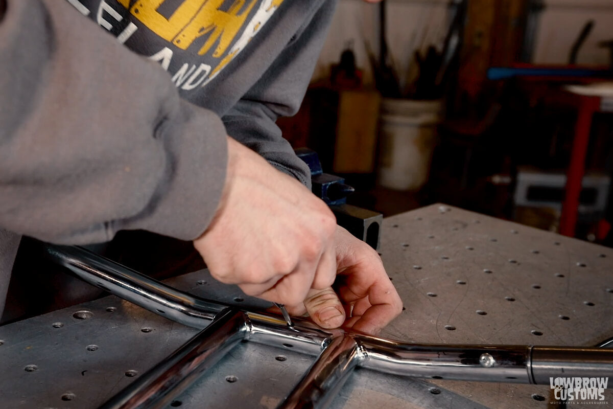 Drilling the handlebars for the internal throttle cable - again, using a center punch will help guide your drill bit