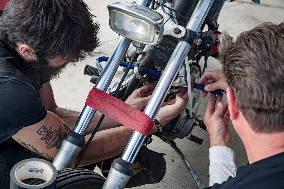 Jay and Greg clamping up the new highway pegs.