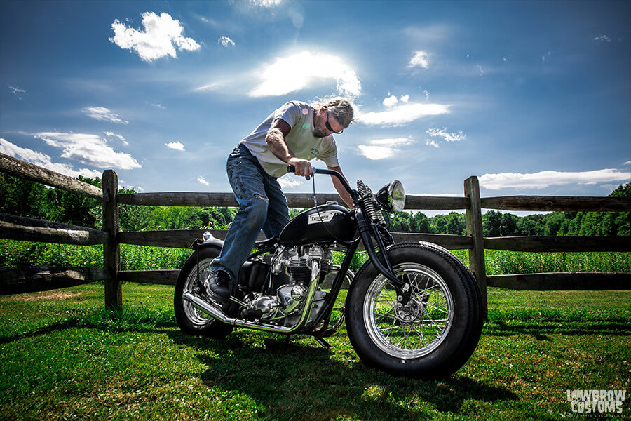 Todd kickstarting his custom 1968 Triumph 650 bobber.