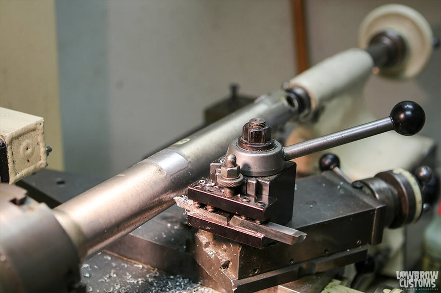 Figure 7 Turning down the fork lowers on a lathe to remove the front fender mounts.