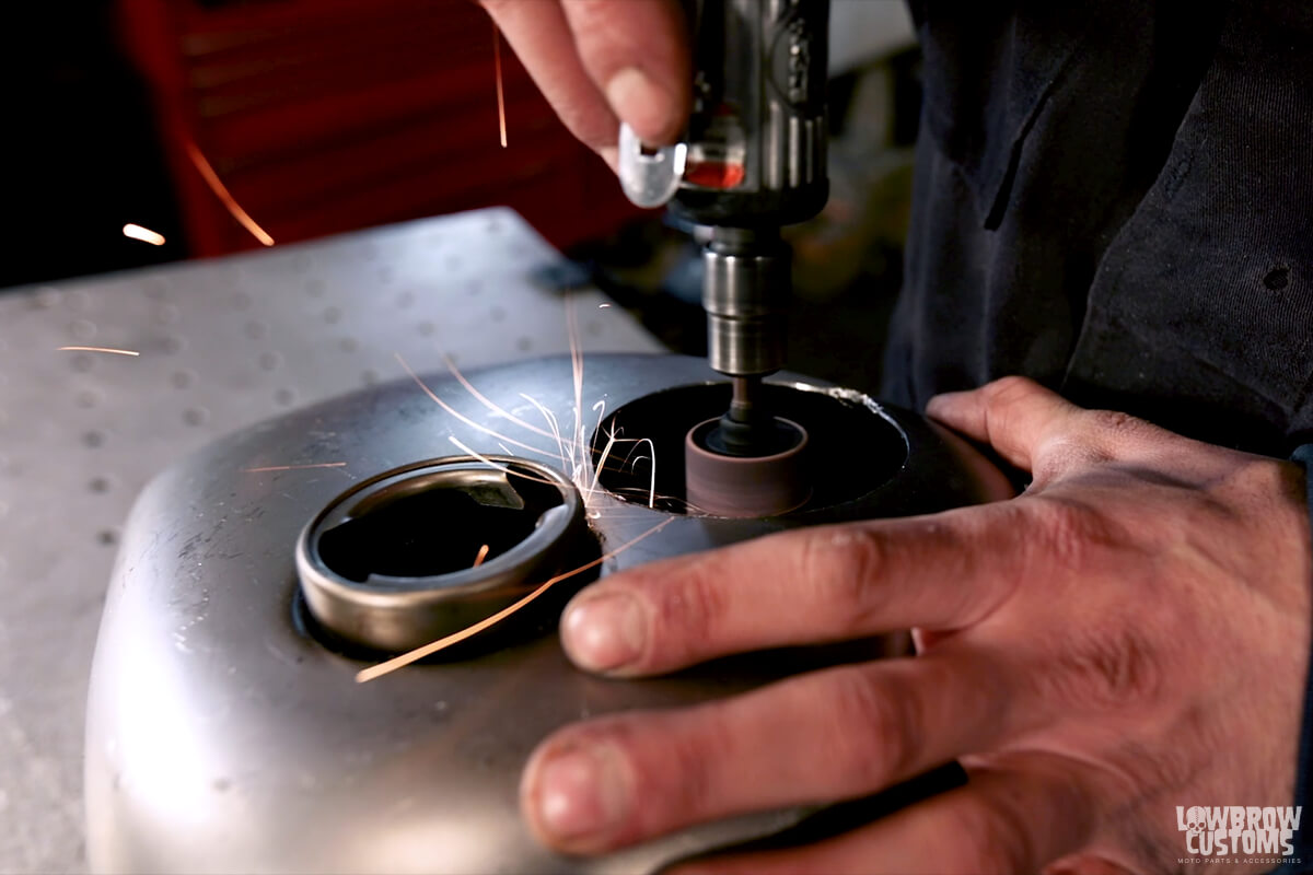 Cutting and Drilling Holes in Gas Tanks for the Key Switch - Grinding out a little more of the large hole