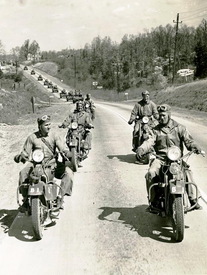 Motorcycles generally lead the pack in a military convo during World War II