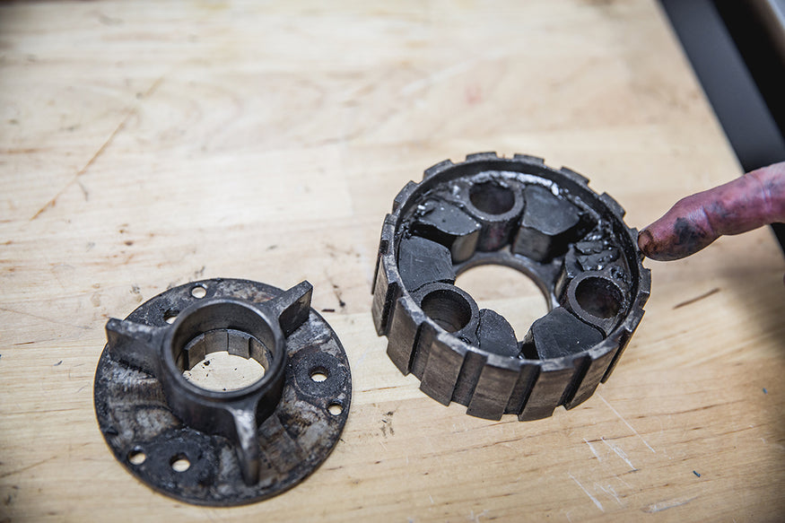 The clutch center hub has three screws that you can remove to inspect the rubbers inside. If they looked damged like this one in the above picture, we recommend to replace the rubbers. Triumph 650 clutch inspection and service-Triumph 650 Clutch Inspection and Service-17