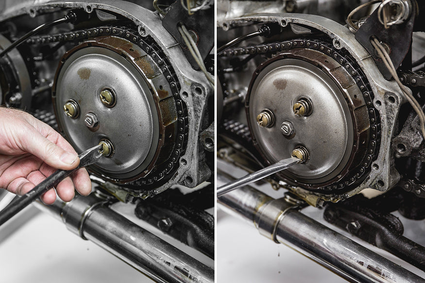 Todd removing the 3 spring adjustment nuts first using a special forked screw driver, after a little bit you can then use a normal flathead screw driver. Triumph 650 clutch inspection and service-Triumph 650 Clutch Inspection and Service-6