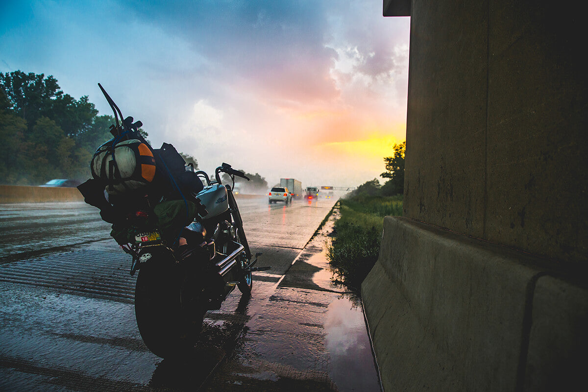 No front fender and heavy rains, followed by epic sunsets and endless colors. This was one of my favorite moments from the first day of travel, wet, cold, tired but in awe on how beautiful the sky was. - Lowbrow Customs - Sturgis 2017