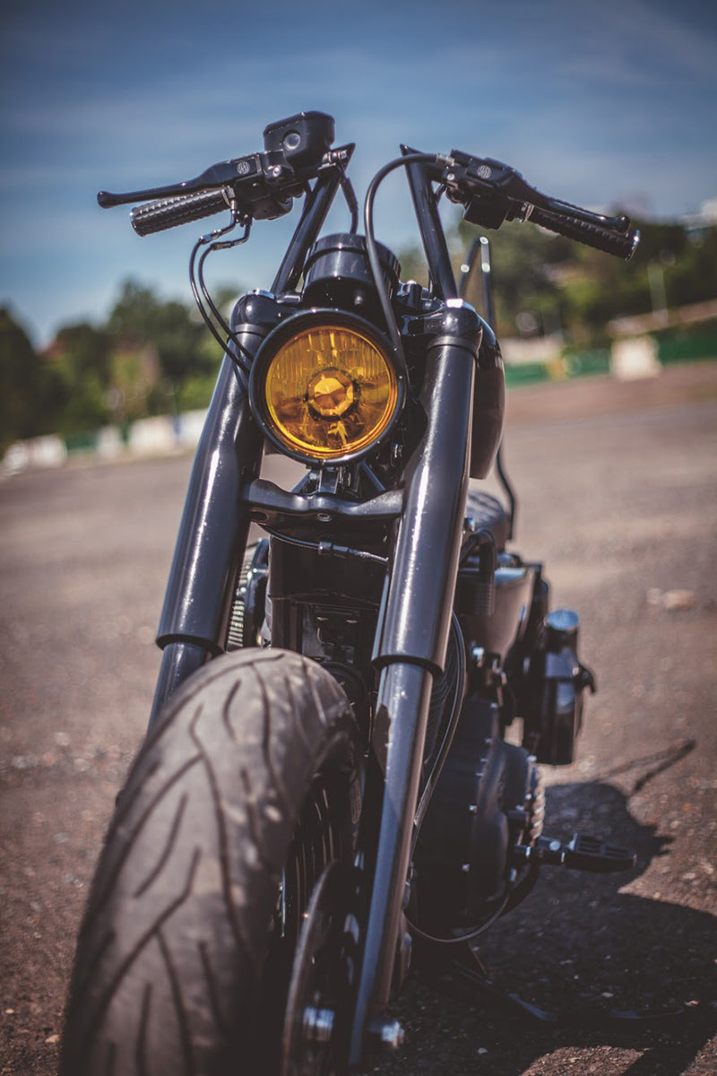 Zach's Sportster features our Lowbrow Customs Fork Shrouds in black.
