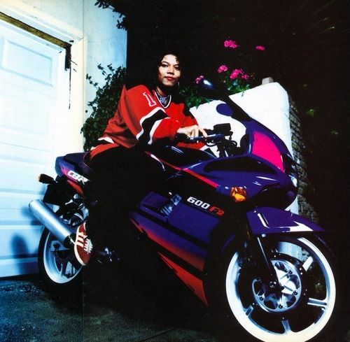 Queen Latifah on a Cbr 600 back in the day. Famous motorcycle riders