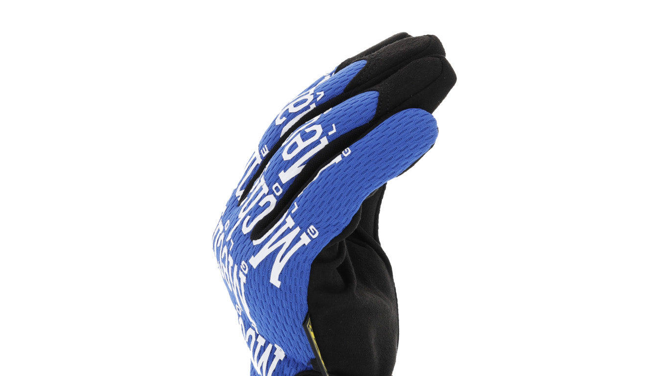 Angled perspective of Mechanix Wear The Original Blue Work Gloves, highlighting their secure wrist closure and tactile palm.