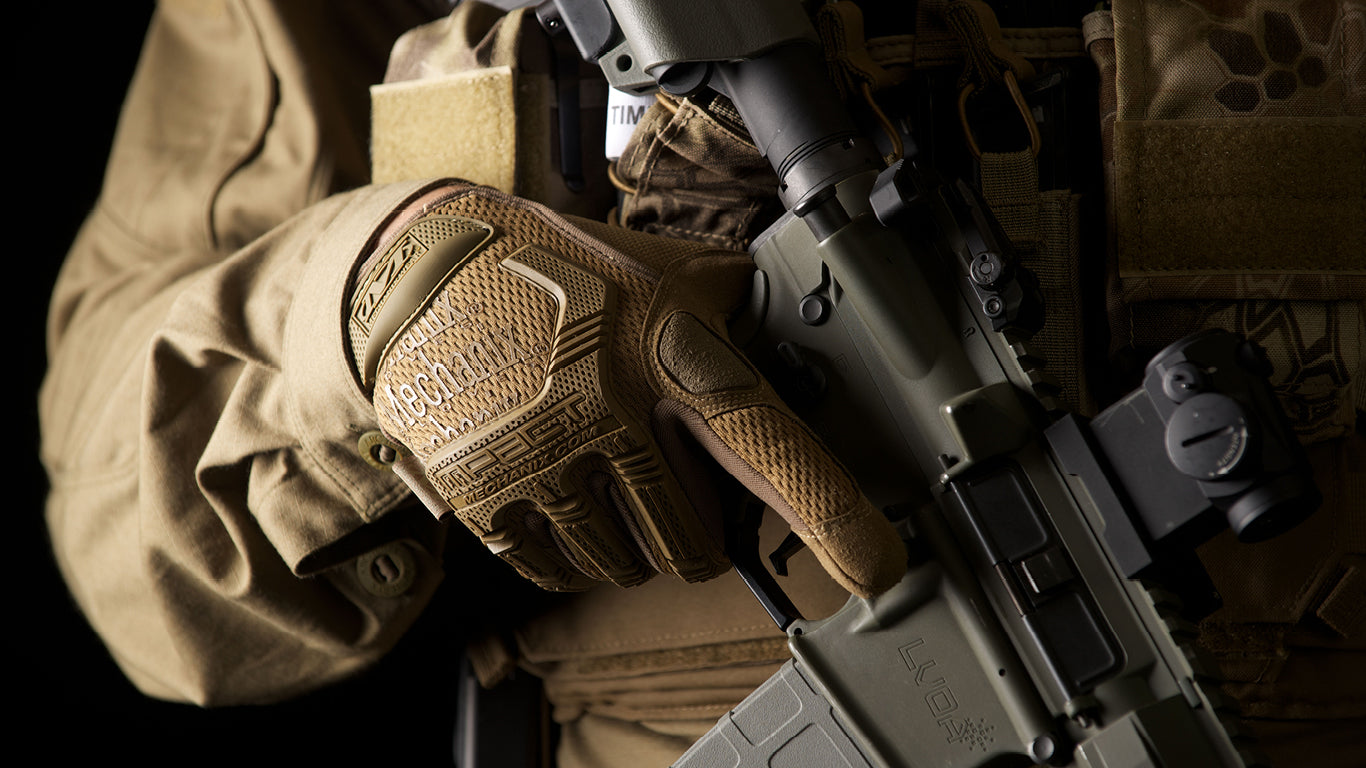 In use picture of Mechanix Wear M-Pact Coyote Tactical Gloves