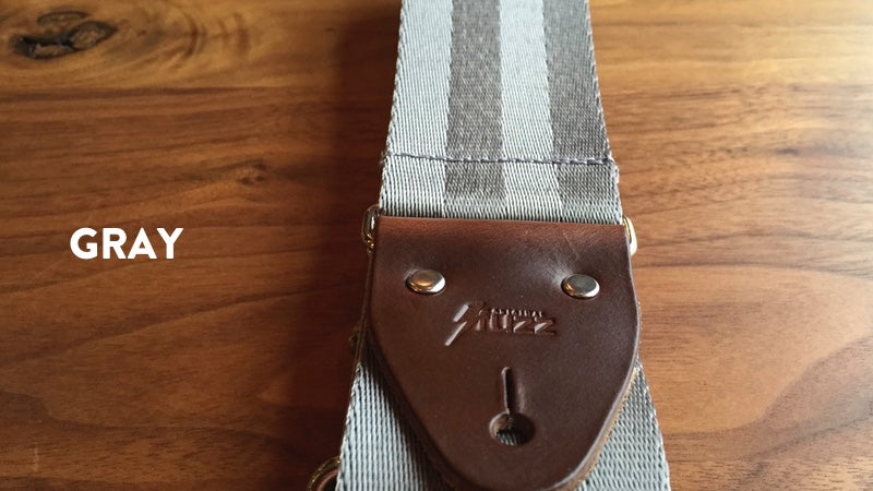 Our seatbelt guitar strap in Gray