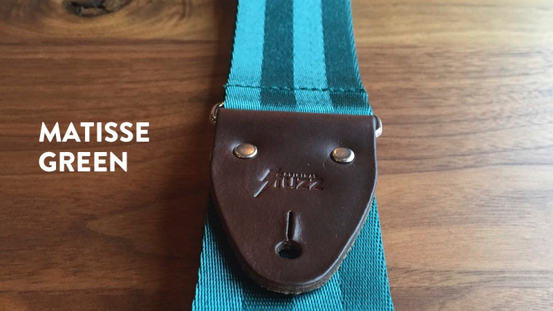 Our seatbelt guitar strap in Matisse Green