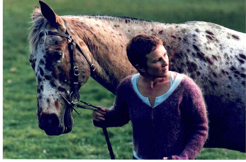 Image of a woman with a horse