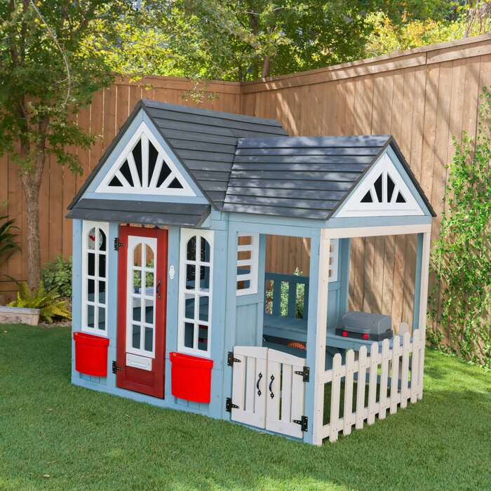 wooden backyard playhouse