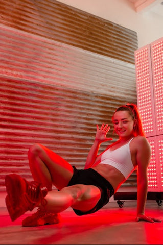 woman exercising during red light therapy