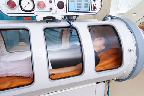 Uncomfortable lady in hyperbaric chamber