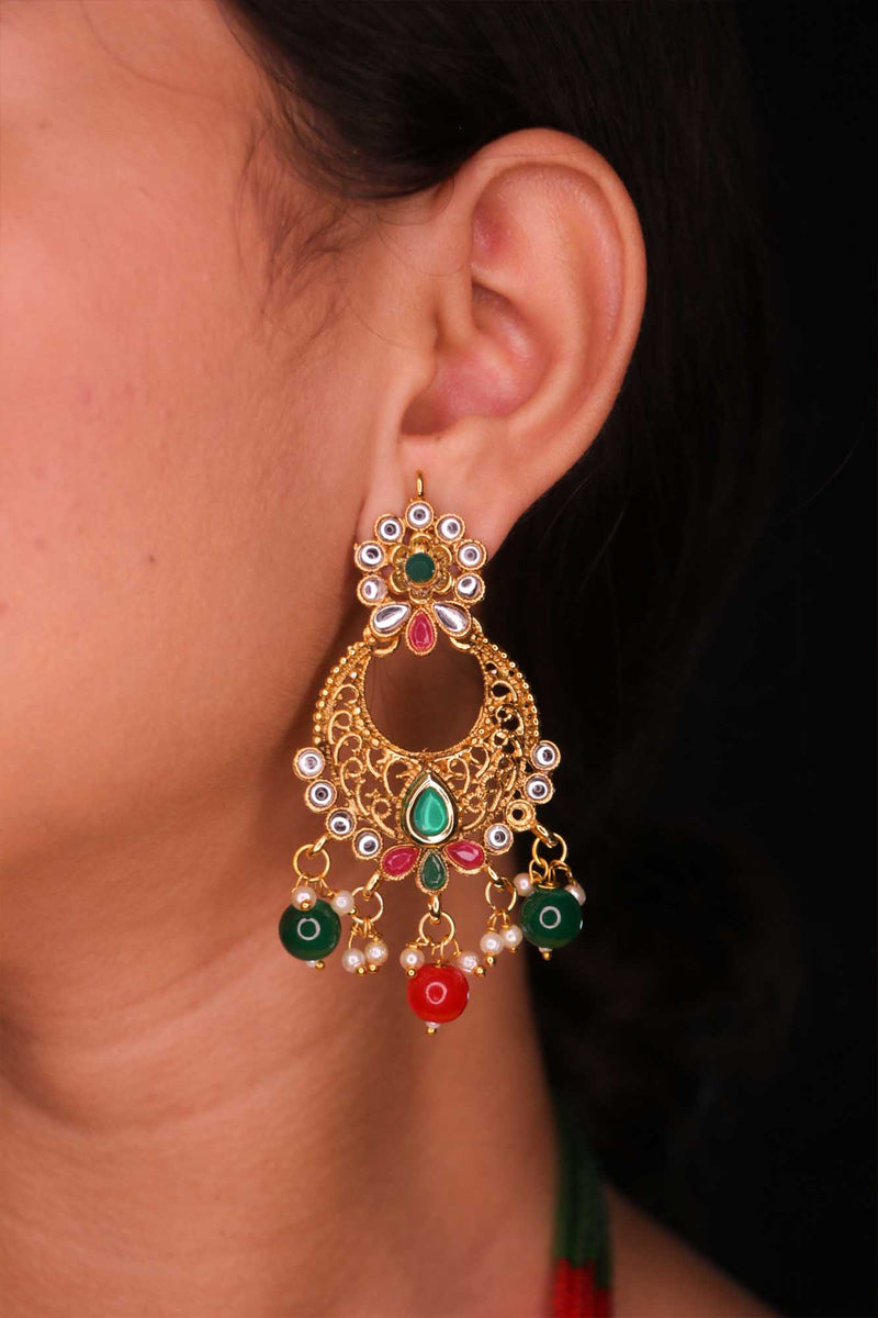 GOLDEN JEWELLERY SET WITH RED AND GREEN MOTI