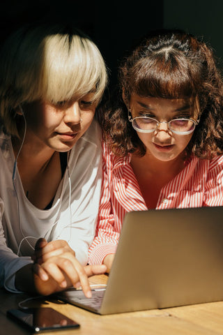 Two woman looking at a Laptop 