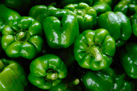 A group of green Bell peppers